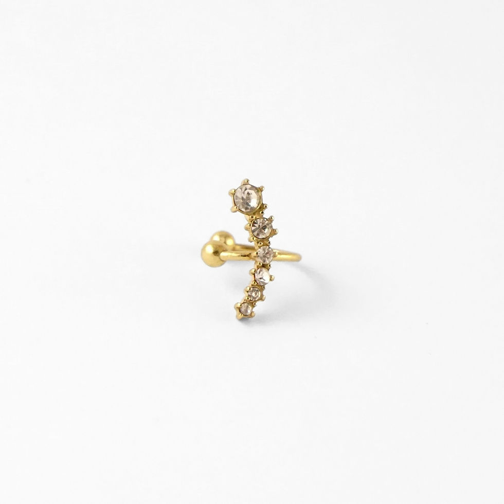 Miniature : ear cuff scintillant et raffiné au design courbé, parfait pour illuminer l’oreille en un instant.