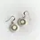 Thumbnail: Circle Dangle Earrings by Stitch Prism