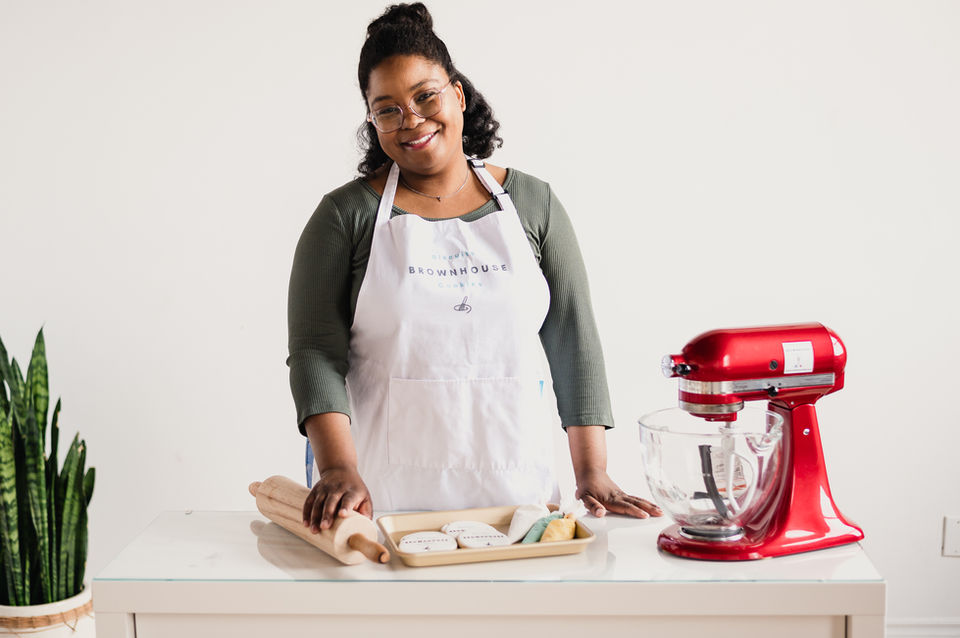 woman baking and smiling