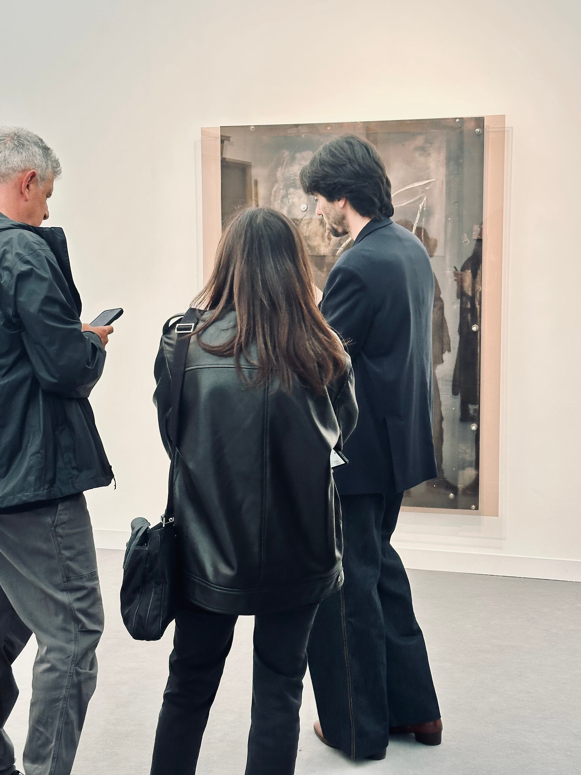 “He’s been pretending to understand this painting for ten minutes.”
