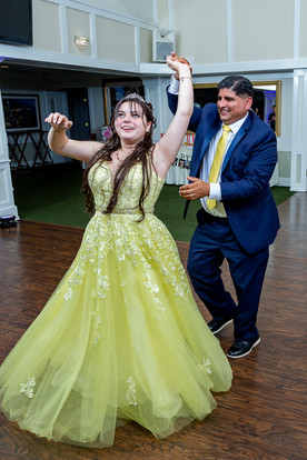 The Quinceañera shares a touching dance with her father during her 15th birthday party.