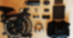 Folding bike, headphones, sunglasses, small JBL speaker, water bottle, men's bag, and other accessories.