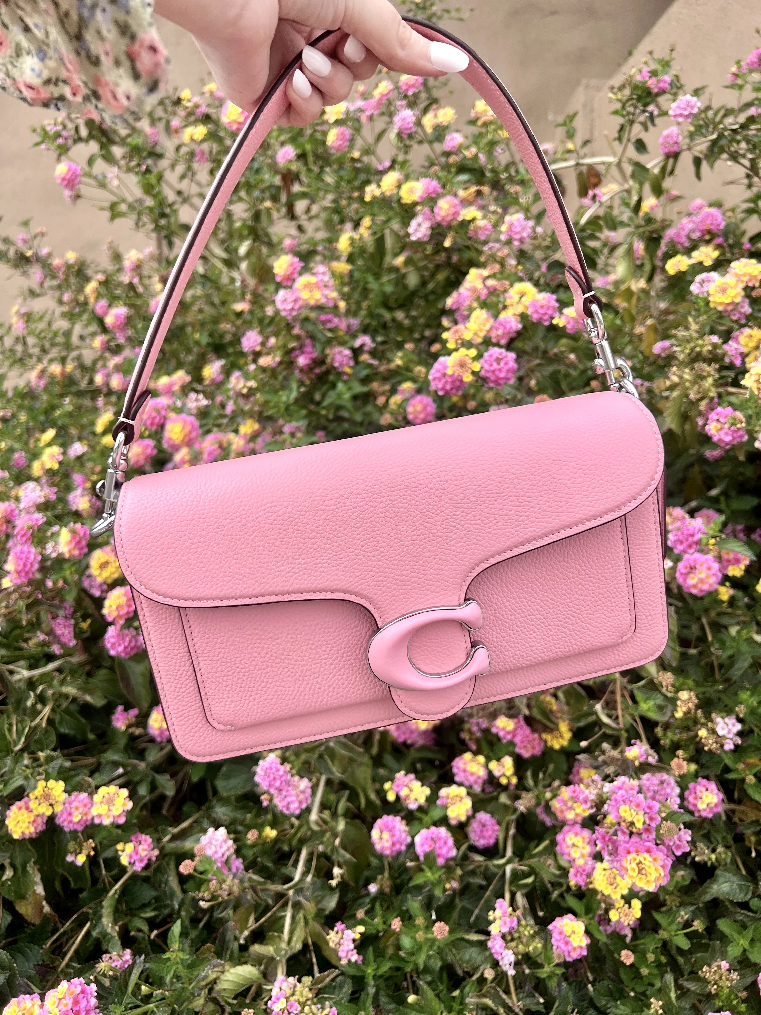 Featured in the Top 20 Sweet 16 Gift Ideas, this stylish pink designer handbag is perfect for adding a touch of elegance to any outfit.