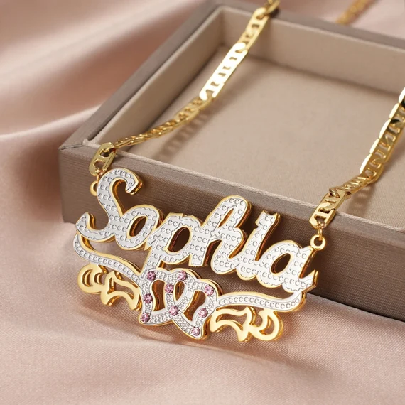 This custom necklace with the name 'Sophia' is a perfect Sweet 16 gift idea, adding a personalized touch of elegance to any outfit. This gold necklace is featured in the Top 20 Sweet 16 Gift Ideas.