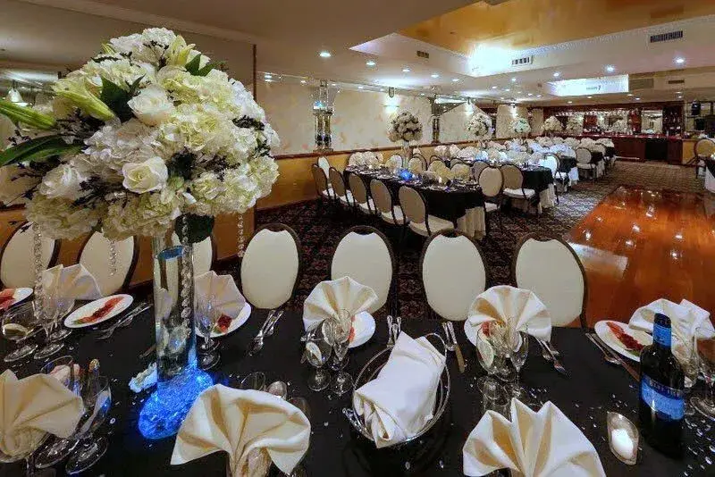 Gennaro’s Catering Hall Quinceañera venue in Brooklyn NYC with decorated banquet room and dance floor