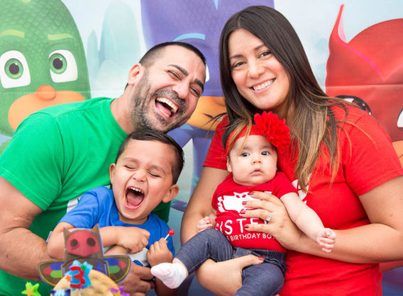 Parents enjoying themselves at their daughter's first birthday party in Totowa New Jersey.