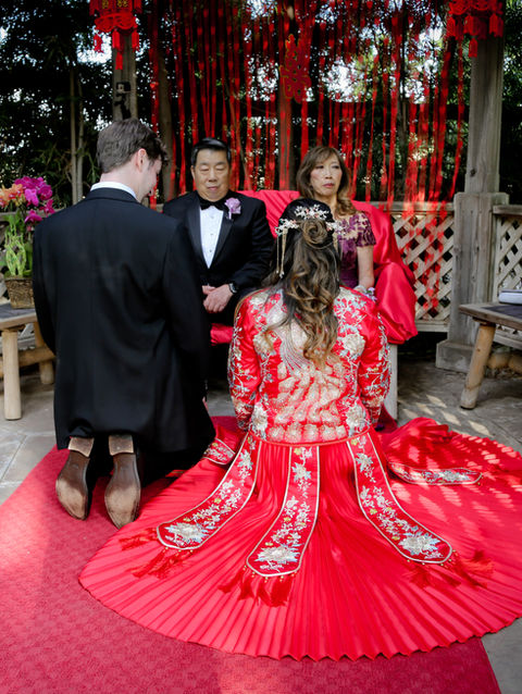 Bride and groom sharing tea with family during wedding tea ceremony at East Contra Costa wedding venue.