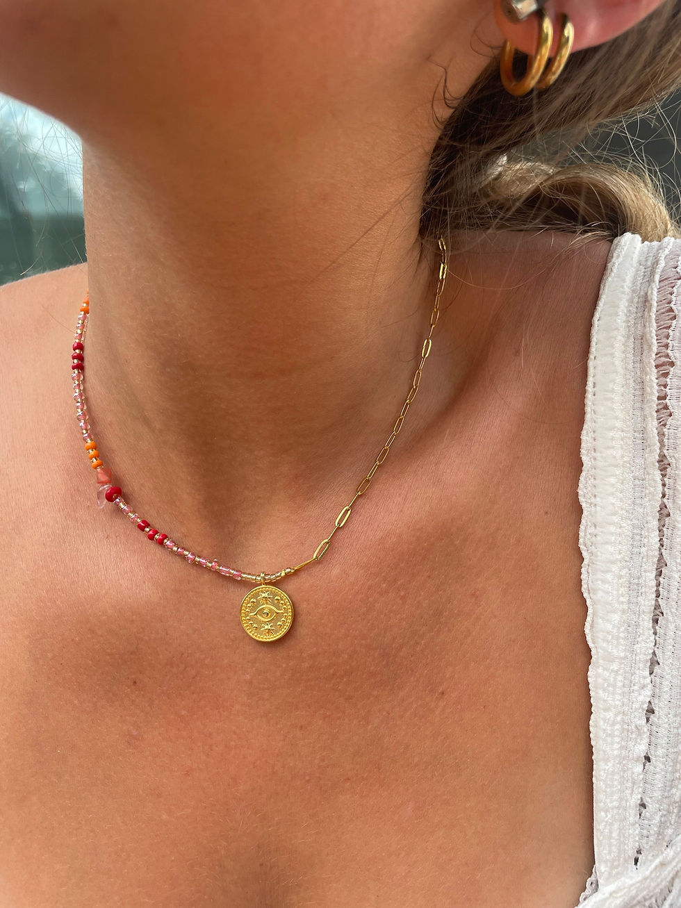 Miniaturbild: Asymmetrische Kette mit roten Perlen