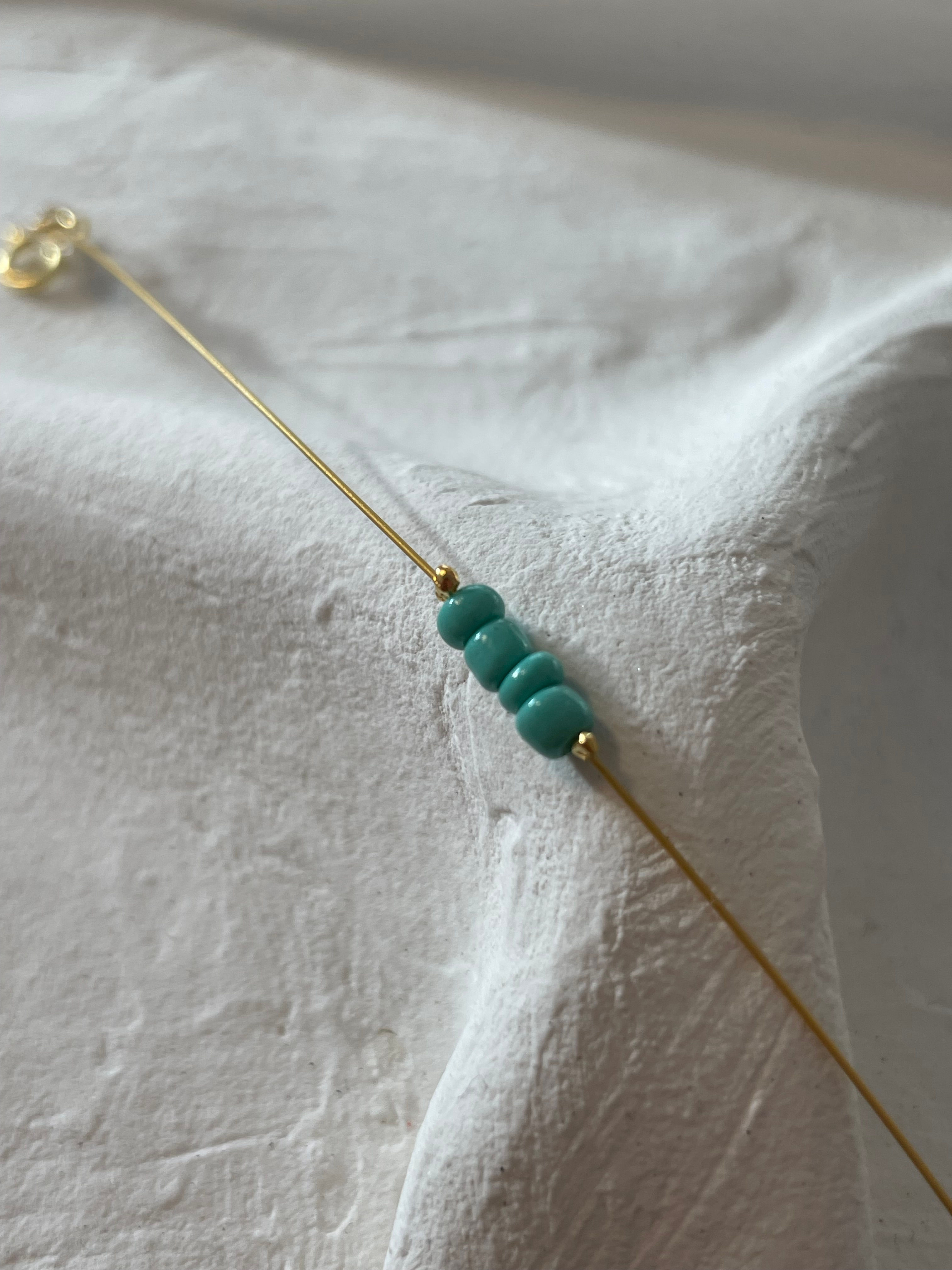 zartes Armband in türkis und gold