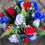 Thumbnail: Silk Flowers Grave Pot Red White and Blue Rosebuds and Fern