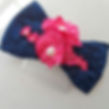 Hair Accessory with navy bow, hot pink flowers and pearls on a hair comb