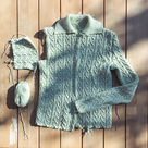 A Green Cardigan in Cable Pattern