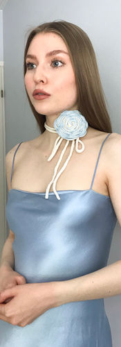a girl in a blue dress