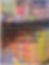 A blurry background of football card bokes, with the text 'The risks and benefits of buying cards, packs, boxes and cases of football cards' overlaying it.