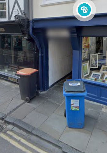 A google map image showing the alleyway for step free access, although in the image it is blocked by bins.