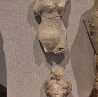 An artefact from inside the museum. It shows a headless and mostly limbless naked female body.