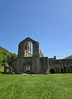 A view of Fountains abbey taken on a sunny, clear day.