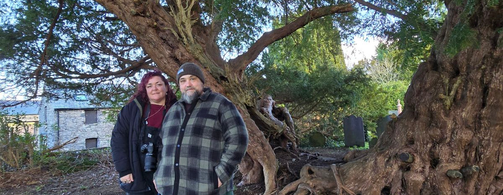 Me and Bob standing beside the ancient Llangernyw Yew.