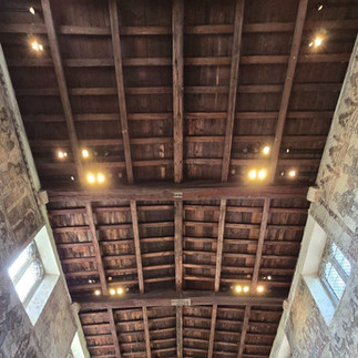 Medieval wall paintings and timber roof of the church.