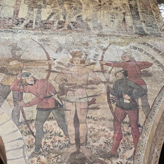 Medieval wall painting of Saint Edmund's martyrdom.