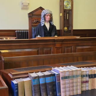 Judge mannequin in the 1895 courtroom exhibit.