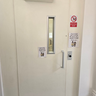 Accessible lift door at Greater Manchester Police Museum