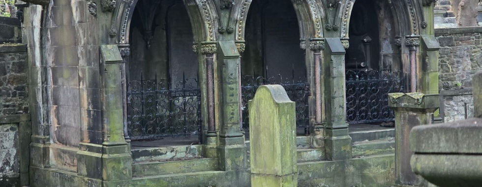 Gothic stone mausoleums in an Edinburgh graveyard.