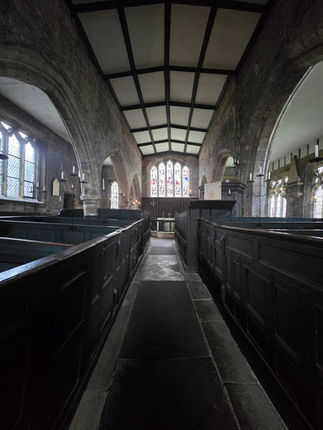 The aisle of the church looking towards the altar.