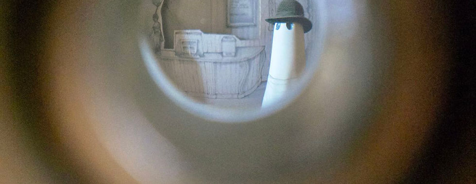 View through a York Ghost Merchants shop peephole.