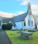 The side view of St Digains church as seen from the lychgate path.
