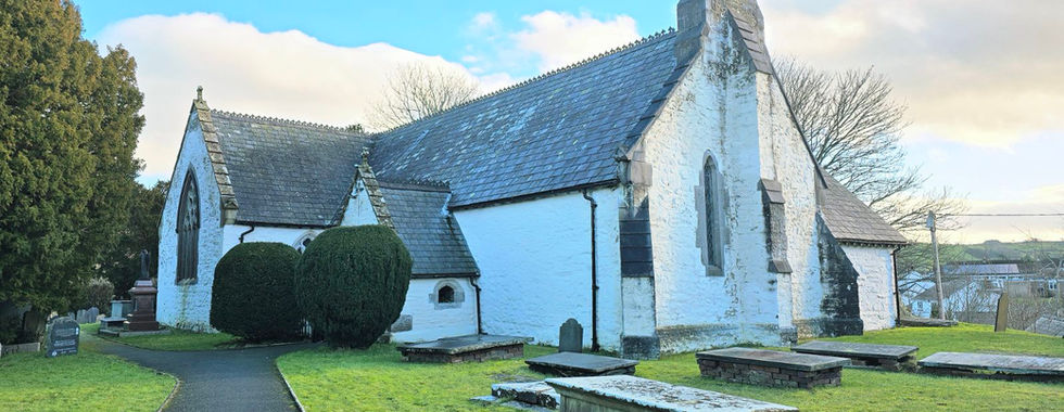 St. Digain's Church exterior with accessible path and graveyard.