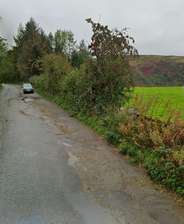 Uneven access road leading to Castlerigg Stone Circle.