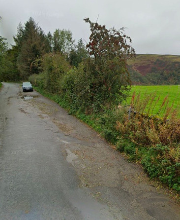 Uneven access road leading to Castlerigg Stone Circle.