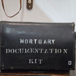 Vintage black Mortuary Documentation Kit case at the museum.