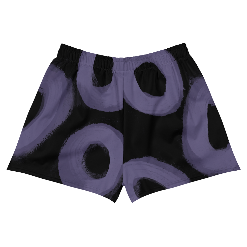 Back view of purple circle print athletics shorts.