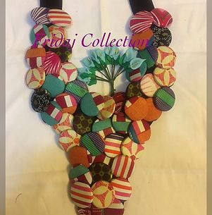 Ankara button necklace handmade from 🇸🇱#fridajcollection #bosschick