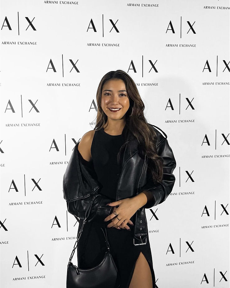 Close-up view of a model showcasing Armani Exchange attire