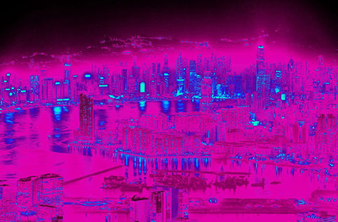 Vibrant fuchsia and aqua cityscape transformed with Photoshop Gradient Maps to explore color and mood.