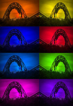 Boldly colored roller coaster skyline in symmetry arrangement using Photoshop Adjustment Layers to explore color and mood.