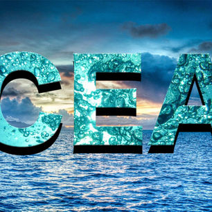 Student-created clipping mask design featuring the word "Ocean" filled with scenic photography.