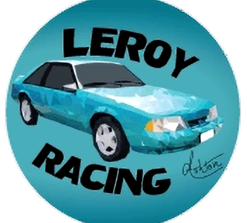 Student-designed wearable button featuring original digital artwork of car created as a small-format expression of creativity.