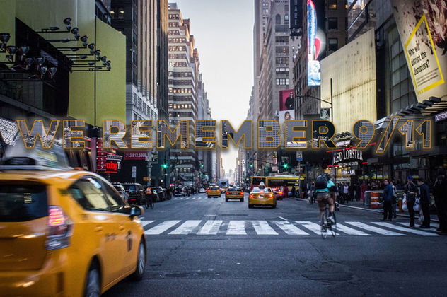 Student-created clipping mask design featuring New York City and the words "We Remember 9/11" filled with patriotic photography.