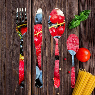 Student Photoshop composition featuring custom clipping masks, layered imagery, and rustic silverware themed visual design.