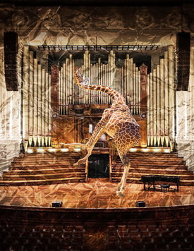 Student-created digital artwork featuring a creatively posed giraffe in an imaginative environment using Photoshop Puppet Warp, compositing, and visual storytelling techniques.