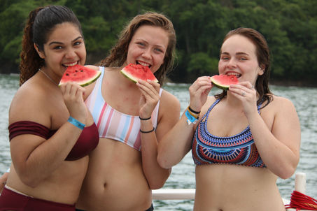 "Sunset sailing tour in Manuel Antonio"
"Catamaran cruise with dolphin sightings"
"Guests enjoying sunset views from a catamaran"
"Sailing the coast of Manuel Antonio at sunset"