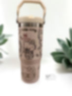 Custom engraved Hello Kitty Stanley 30oz Ice Flow Flip Straw with cute bow detail front view photo