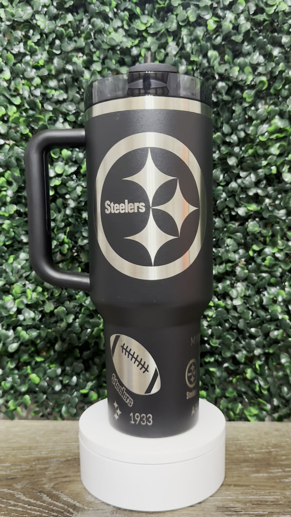 360° video of a Stanley Quencher in Black with a laser-engraved Steelers design spinning to show the full deta