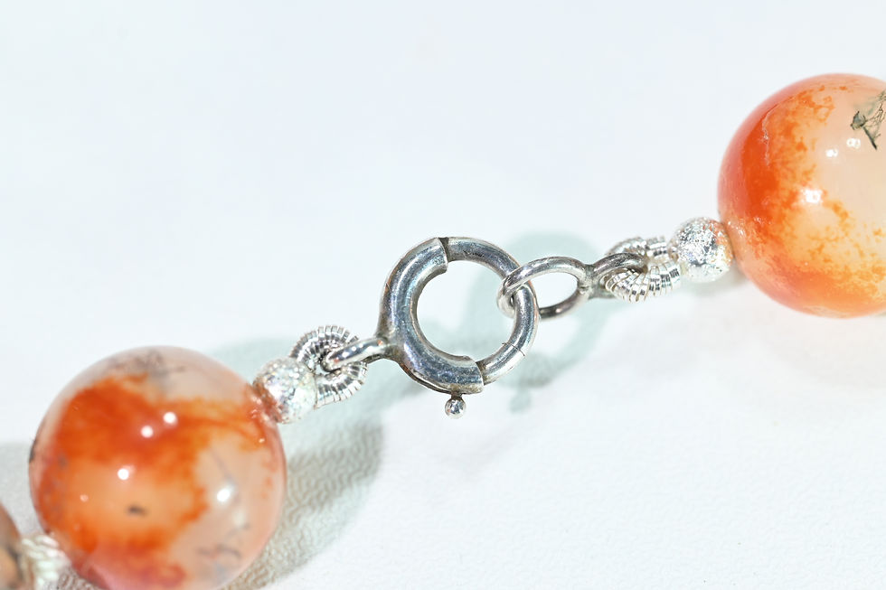 Thumbnail: Antique agate necklace restored