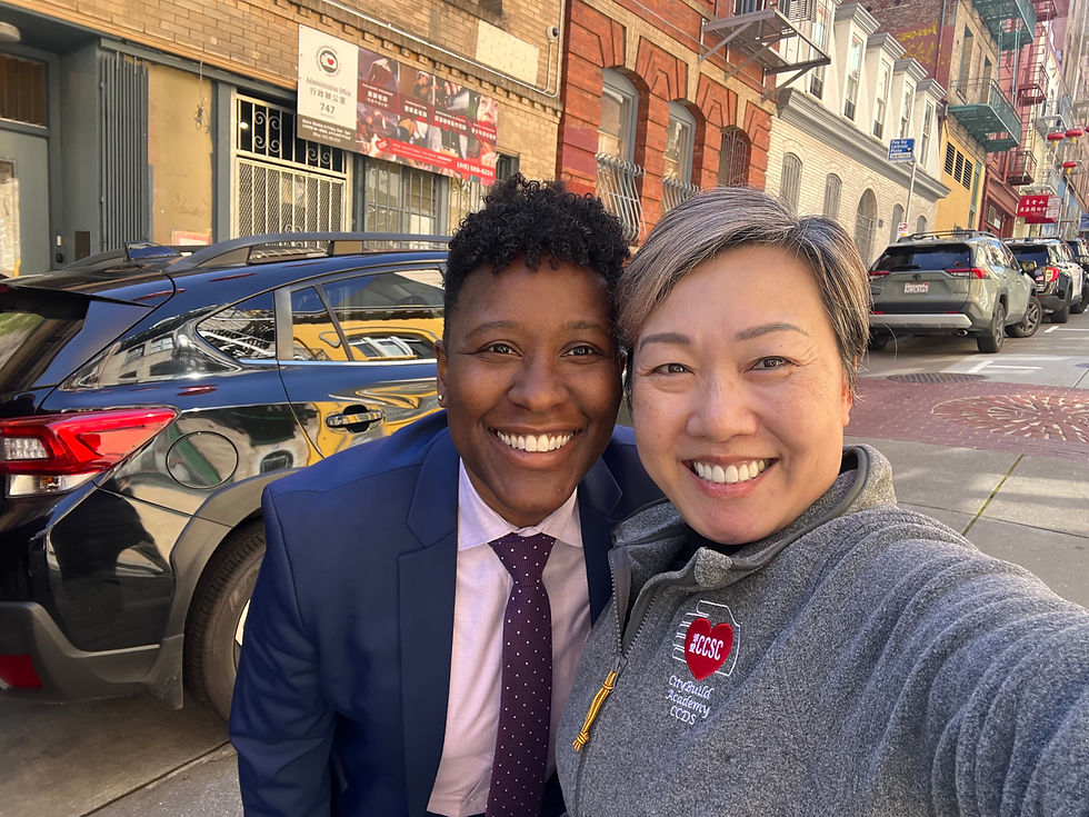 CCSC Executive Director Ashley Cheng with Iowayna Peña at a Lunar New Year food giveaway event in San Francisco’s Chinatown.