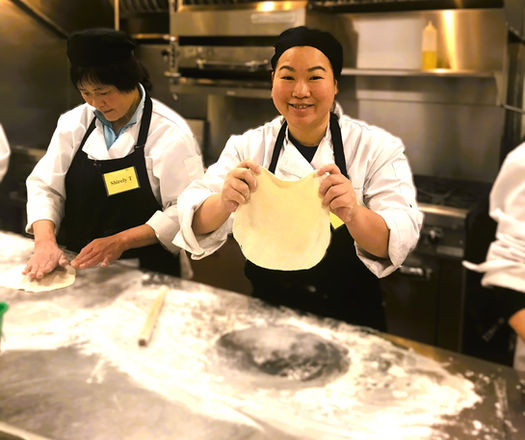 Chinese Cooking Class student preparing dough